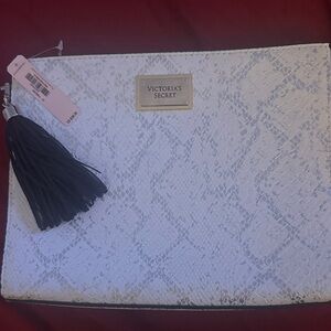 Victoria's Secret White and Silver Clutch with removable tassel.